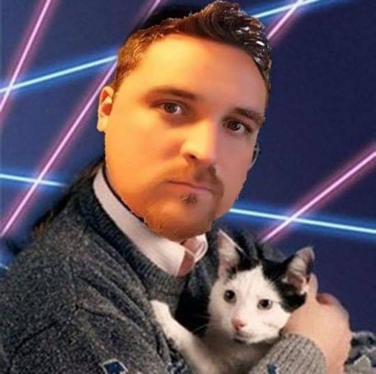 An early-90s styled, poorly photoshopped portrait of my friend's face on an old Sears Photoshoot picture; in it, he wears a terribly tacky sweater and holds a very confused cat.