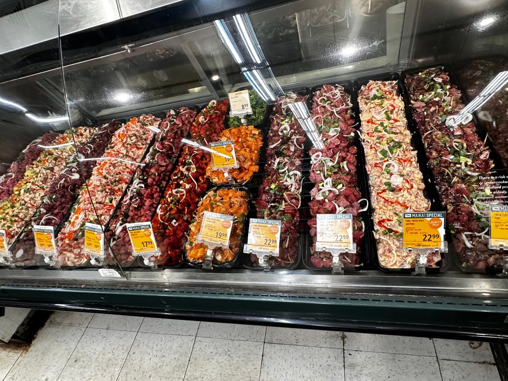 Insanely fresh poke in the small grocery store we stopped at. Rows of it include various flavors and sauces. It's a colorful feast.
